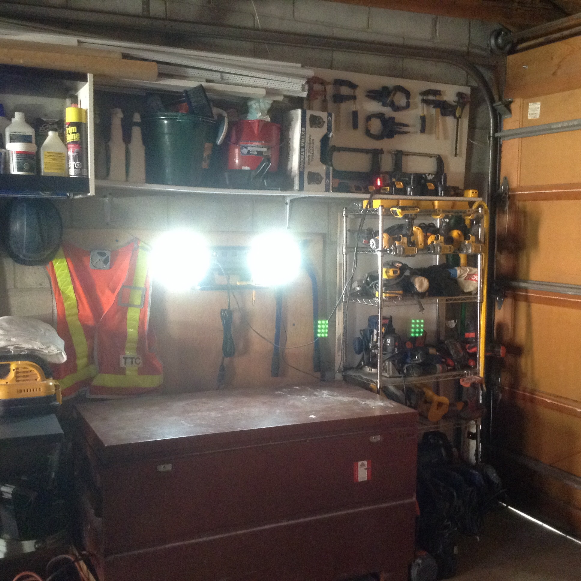 clamps, safety vest, power tools and chargers